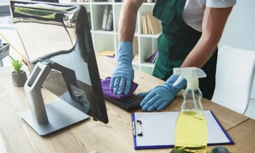 Team of cleaners disinfecting office space in Toronto.